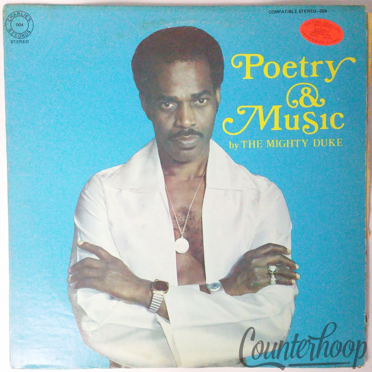 The Mighty Duke – Poetry & Music 1977 NM Charlie's- Art DeCouteau,Pelham Goddard — main photograph