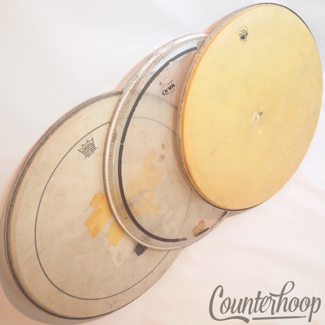 Remo Fiberskyn 2, Weatherking Pinstripe, Evans Emad 3x 24"Bass Drum Batter Heads — main photograph