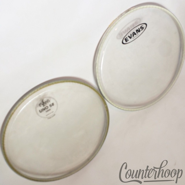 Evans 2x 10" Tom Drum Heads Hydraulic+Uno 58 Cad/Cam Clear Batter/Resonant USA* — main photograph